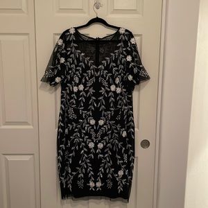 Navy blue dress with white beading